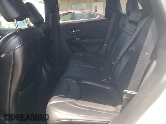 2019 Jeep Cherokee Latitude Plus z VIN 1C4PJLLB5KD406667, wystawiony jako Copart lot #62177795 z przebiegiem 131 822 mil mil oraz Szkoda całkowita • Salvage title. Historia ofert i sprzedaży dostępna na DreamBid. Obrazek 11.