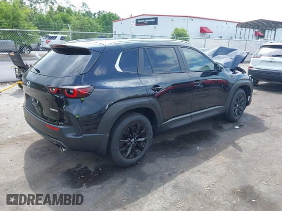 2025 Mazda CX-50 S Select with VIN 7MMVABAMXSN326118, listed as a IAAI auction lot 42136197 with 5,142 mi miles and . Bid and sale history available at DreamBid. Image 4.