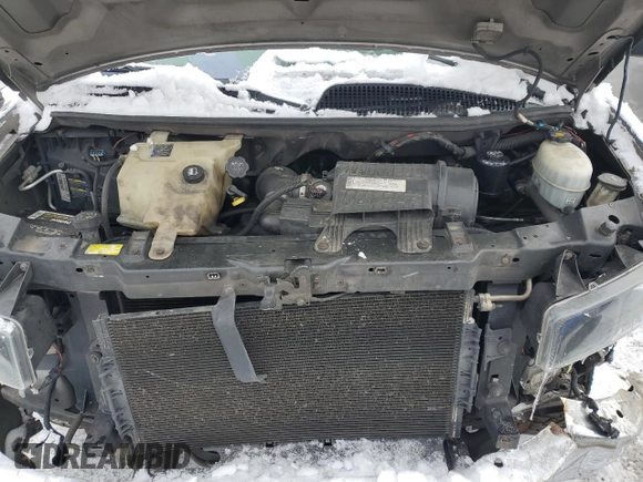 2007 Chevrolet Express Passenger z VIN 1GAHG39U471178707, wystawiony jako Copart lot #86510224 z przebiegiem Nie podano mil oraz Szkoda całkowita • Salvage title. Historia ofert i sprzedaży dostępna na DreamBid. Obrazek 13.
