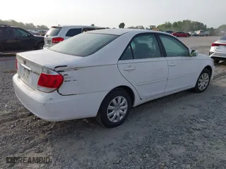 2005 Toyota Camry STD with VIN 4T1BE32K85U401432, listed as a IAAI auction lot 42093301 with 228,557 mi miles. Bid and sale history available at carsss.com. Image 4.