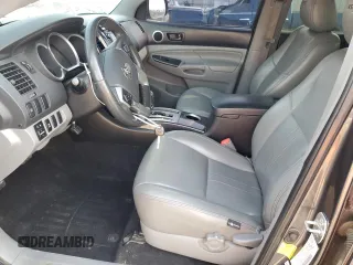 2014 Toyota Tacoma PreRunner with VIN 5TFJU4GN4EX051159, listed as a Copart auction lot 49817645 with 130,001 mi miles and Salvage Title. Bid and sale history available at carsss.com. Image 7.