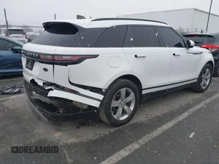 2018 Land Rover Range Rover Velar S z VIN SALYB2RX5JA722934, wystawiony jako IAAI lot #41620738 z przebiegiem 96 804 mil mil oraz . Historia ofert i sprzedaży dostępna na DreamBid. Obrazek 4.