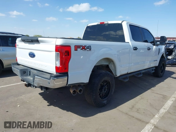 2017 Ford F-250 Lariat with VIN 1FT7W2BT8HEE20684, listed as a IAAI auction lot 41726253 with 90,898 mi miles and . Bid and sale history available at DreamBid. Image 4.
