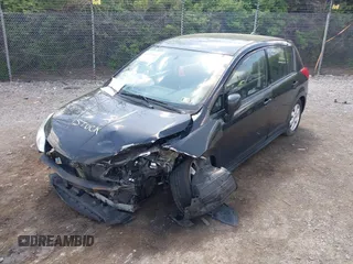 2012 Nissan Versa S with VIN 3N1BC1CP1CK278212, listed as a IAAI auction lot 42097360 with 148,119 mi miles. Bid and sale history available at carsss.com. Image 6.