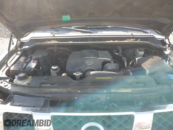 2007 Nissan Titan SE z VIN 1N6BA07B77N214250, wystawiony jako IAAI lot #42142029 z przebiegiem 184 575 mil mil oraz . Historia ofert i sprzedaży dostępna na DreamBid. Obrazek 10.