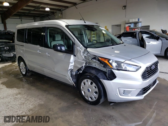 2022 Ford Transit Connect XLT with VIN NM0GE9F25N1515717, listed as a Copart auction lot 57802005 with 59,951 mi miles and Clean title. Bid and sale history available at DreamBid. Image 4.