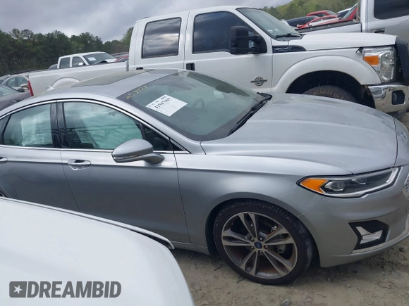 2020 Ford Fusion Titanium с VIN 3FA6P0K91LR128016, выставлен на аукционе IAAI как лот 41947905 с пробегом 79 622 миль миль и . История ставок и продаж доступна на DreamBid. Изображение 13.