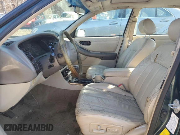 1998 Toyota Avalon XL with VIN 4T1BF18B5WU281065, listed as a Copart auction lot 49978705 with Not Provided miles and Salvage Title. Bid and sale history available at DreamBid. Image 7.