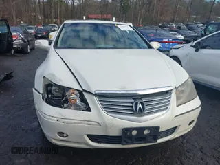 2006 Acura RL z VIN JH4KB16546C002058, wystawiony jako IAAI lot #41286711 z przebiegiem 297 234 mil mil oraz . Historia ofert i sprzedaży dostępna na DreamBid. Obrazek 6.