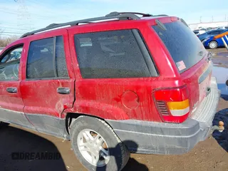 2003 Jeep Grand Cherokee Laredo with VIN 1J4GX48S13C594893, listed as a IAAI auction lot 41688597 with 179,680 mi miles. Bid and sale history available at carsss.com. Image 6.
