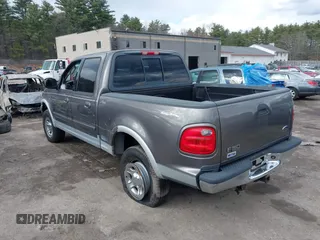 2003 Ford F-150 XLT with VIN 1FTRW08L63KA37275, listed as a IAAI auction lot 41875128 with 133,257 mi miles. Bid and sale history available at carsss.com. Image 3.