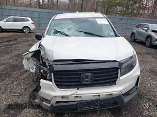 2021 Honda Ridgeline Sport with VIN 5FPYK3F1XMB011441, listed as a IAAI auction lot 41315524 with 59,840 mi miles and . Bid and sale history available at DreamBid. Image 12.