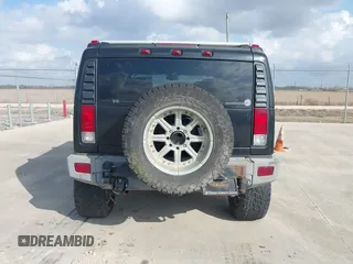 2006 Hummer H2 with VIN 5GRGN23U66H120601, listed as a IAAI auction lot 41524634 with 155,003 mi miles. Bid and sale history available at carsss.com. Image 16.
