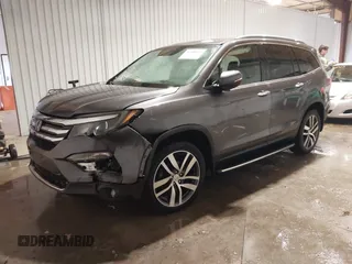 2017 Honda Pilot Touring with VIN 5FNYF6H91HB084737, listed as a IAAI auction lot 41608145 with 86,696 mi miles. Bid and sale history available at carsss.com. Image 17.