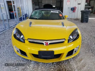 2008 Saturn Sky Red Line z VIN 1G8MF35XX8Y120130, wystawiony jako Copart lot #77553434 z przebiegiem 110 716 mil mil oraz Tytuł czysty. Historia ofert i sprzedaży dostępna na DreamBid. Obrazek 5.