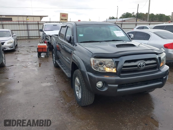 2009 Toyota Tacoma z VIN 3TMLU42N09M034743, wystawiony jako IAAI lot #41467696 z przebiegiem 129 395 mil mil oraz . Historia ofert i sprzedaży dostępna na DreamBid. Obrazek 1.