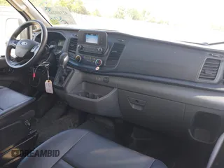 2023 Ford Transit Cargo with VIN 1FTBR1X81PKB46146, listed as a IAAI auction lot 42180262 with 75,169 mi miles and . Bid and sale history available at DreamBid. Image 12.