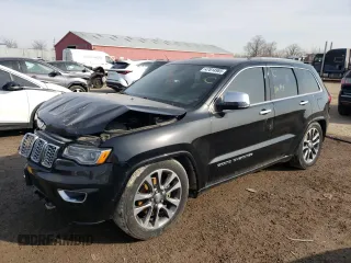 2018 Jeep Grand Cherokee Overland with VIN 1C4RJFCG8JC262591, listed as a Copart auction lot 47814985 with 135,542 mi miles and Salvage Title. Bid and sale history available at carsss.com. Image 1.