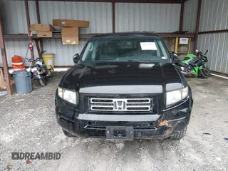 2007 Honda Ridgeline RTL with VIN 2HJYK16547H549241, listed as a IAAI auction lot 42282477 with 214,685 mi miles and . Bid and sale history available at DreamBid. Image 12.