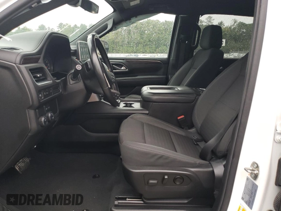 2021 Chevrolet Suburban LS with VIN 1GNSCBKD5MR392512, listed as a Copart auction lot 71238124 with 77,775 mi miles and Salvage Title. Bid and sale history available at DreamBid. Image 7.