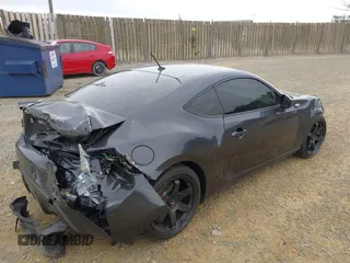 2014 Scion FR-S with VIN JF1ZNAA12E8702261, listed as a IAAI auction lot 41971045 with 124,341 mi miles and . Bid and sale history available at DreamBid. Image 6.