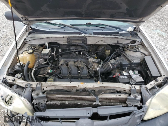 2003 Mazda Tribute LX with VIN 4F2YZ04153KM20941, listed as a Copart auction lot 82683264 with 195,240 mi miles and Salvage Title. Bid and sale history available at DreamBid. Image 14.