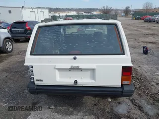 1996 Jeep Cherokee Sport with VIN 1J4FJ68S6TL234012, listed as a IAAI auction lot 41571658 with 255,817 mi miles. Bid and sale history available at carsss.com. Image 17.