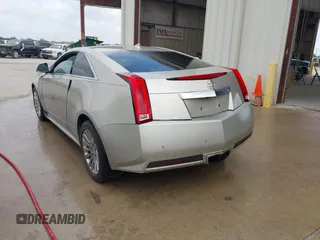 2013 Cadillac CTS Coupe Premium with VIN 1G6DS1E36D0107566, listed as a IAAI auction lot 42079197 with 122,386 mi miles. Bid and sale history available at carsss.com. Image 3.