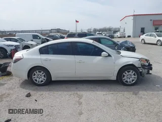 2009 Nissan Altima S with VIN 1N4AL21E09C126880, listed as a IAAI auction lot 41739604 with 258,940 mi miles and . Bid and sale history available at DreamBid. Image 14.