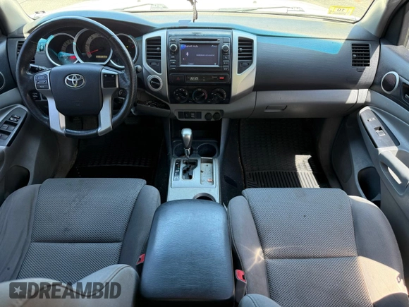 2013 Toyota Tacoma with VIN 5TFLU4EN1DX063442, listed as a Copart auction lot 62521295 with 211,682 mi miles and Clean title. Bid and sale history available at DreamBid. Image 9.