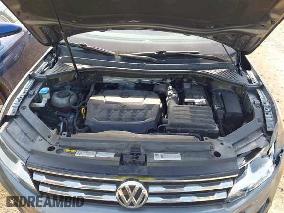 2018 Volkswagen Tiguan S with VIN 3VV0B7AX5JM108306, listed as a IAAI auction lot 42741783 with 71,040 mi miles and . Bid and sale history available at DreamBid. Image 10.