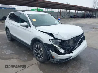 2021 Volkswagen Tiguan SE with VIN 3VV3B7AX0MM008938, listed as a IAAI auction lot 41610367 with 76,723 mi miles and . Bid and sale history available at DreamBid. Image 1.