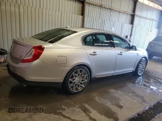2013 Lincoln MKS z VIN 1LNHL9EK0DG605184, wystawiony jako Copart lot #51914305 z przebiegiem 173 117 mil mil oraz Szkoda całkowita • Salvage title. Historia ofert i sprzedaży dostępna na DreamBid. Obrazek 3.
