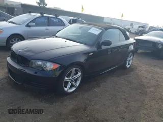 2010 BMW 1 Series 135i with VIN WBAUN9C54AVK41785, listed as a IAAI auction lot 41228825 with 60,817 mi miles and . Bid and sale history available at carsss.com. Image 2.