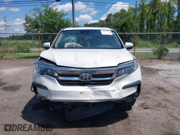 2019 Honda Pilot EX-L with VIN 5FNYF5H42KB026108, listed as a IAAI auction lot 42387593 with 112,556 mi miles and . Bid and sale history available at DreamBid. Image 12.