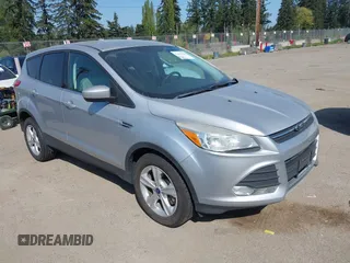 2014 Ford Escape SE with VIN 1FMCU9GX1EUB48145, listed as a IAAI auction lot 42111206 with 113,006 mi miles and . Bid and sale history available at carsss.com. Image 1.