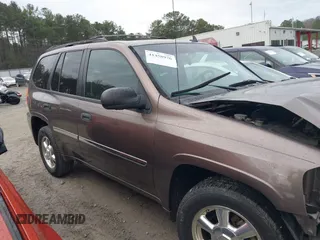 2008 GMC Envoy SLE2 with VIN 1GKDS13S882139862, listed as a IAAI auction lot 41458976 with 195,973 mi miles. Bid and sale history available at carsss.com. Image 13.