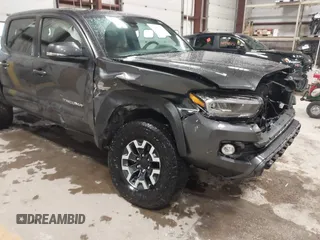 2021 Toyota Tacoma SR z VIN 3TMCZ5AN2MM444249, wystawiony jako IAAI lot #41942146 z przebiegiem 59 429 mil mil oraz . Historia ofert i sprzedaży dostępna na DreamBid. Obrazek 6.