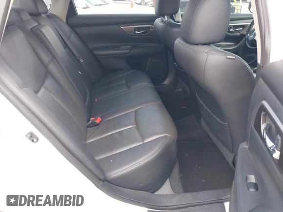 2014 Nissan Altima SV with VIN 1N4AL3AP0EC325820, listed as a IAAI auction lot 41971311 with 206,134 mi miles and . Bid and sale history available at DreamBid. Image 8.