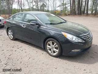 2013 Hyundai Sonata SE with VIN 5NPEC4AC9DH807963, listed as a IAAI auction lot 41971858 with 117,037 mi miles. Bid and sale history available at carsss.com. Image 1.