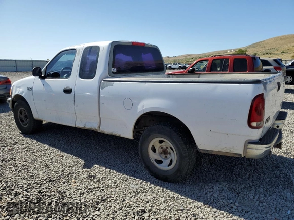 1998 Ford F-150 with VIN 1FTZX1720WKA20813, listed as a Copart auction lot 63852215 with 215,729 mi miles and Salvage title. Bid and sale history available at DreamBid. Image 2.