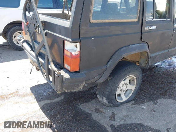 1995 Jeep Cherokee Sport with VIN 1J4FJ68S5SL541413, listed as a IAAI auction lot 42722408 with 335,432 mi miles and . Bid and sale history available at DreamBid. Image 6.