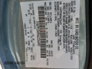 2006 Ford Taurus SE with VIN 1FAFP53U96A226497, listed as a Copart auction lot 82565654 with Not Provided miles and Salvage Title. Bid and sale history available at DreamBid. Image 13.