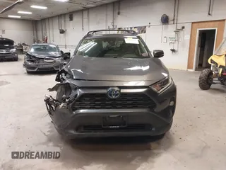 2021 Toyota RAV4 Hybrid XLE with VIN JTMRWRFV2MD125979, listed as a IAAI auction lot 41686695 with 79,737 mi miles. Bid and sale history available at carsss.com. Image 13.