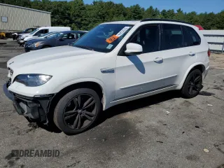 2011 BMW X5 M with VIN 5YMGY0C57BLK26432, listed as a Copart auction lot 67023344 with 74,800 mi miles and Salvage Title. Bid and sale history available at carsss.com. Image 1.