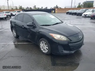 2012 Mazda Mazda3 i Touring with VIN JM1BL1VG5C1506157, listed as a IAAI auction lot 41629654 with 144,475 mi miles. Bid and sale history available at carsss.com. Image 1.