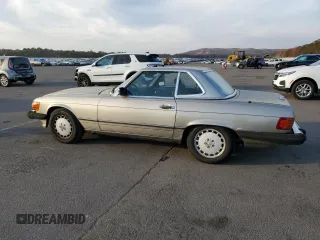 1987 Mercedes-Benz 560 560SL with VIN WDBBA48D9HA070265, listed as a Copart auction lot 77411844 with 120,884 mi miles and Salvage Title. Bid and sale history available at carsss.com. Image 2.
