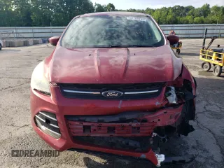 2013 Ford Escape SE with VIN 1FMCU0GX1DUB90907, listed as a Copart auction lot 57789785 with 113,525 mi miles and Salvage title. Bid and sale history available at DreamBid. Image 5.