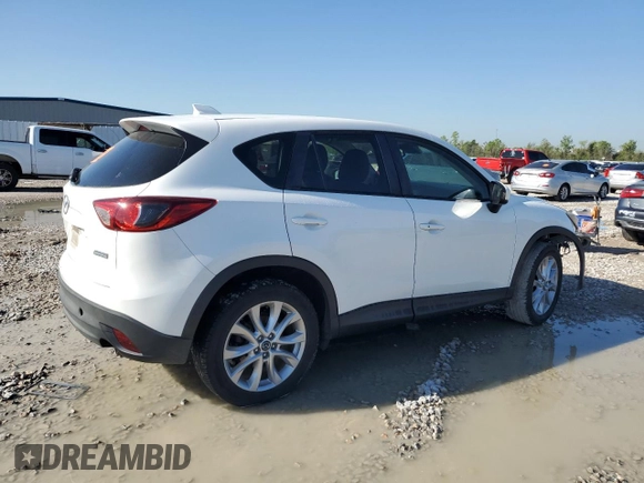 2015 Mazda CX-5 Grand Touring with VIN JM3KE2DY1F0453386, listed as a Copart auction lot 50580185 with 174,309 mi miles and Salvage Title. Bid and sale history available at carsss.com. Image 3.