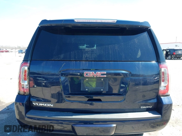 2017 GMC Yukon SLT with VIN 1GKS1BKC9HR356600, listed as a IAAI auction lot 41694218 with 155,855 mi miles. Bid and sale history available at carsss.com. Image 16.